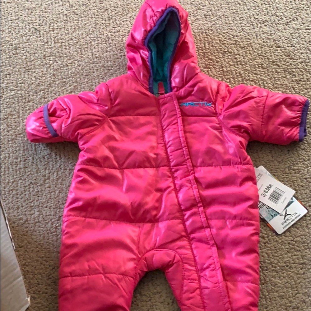 Pink infant snow suit. Worn one time (tags no longer on). Fits small